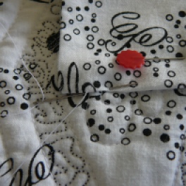Slip stitching the hanging sleeve (rod pocket)