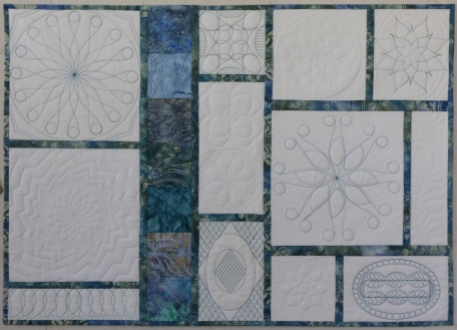 First ruler quilted table topper quilt