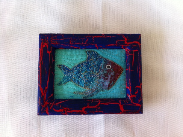 Fish for Brenda (of course!) painted vliesofix on hand dyed fabric, thread sketched with metallic polyester thread.